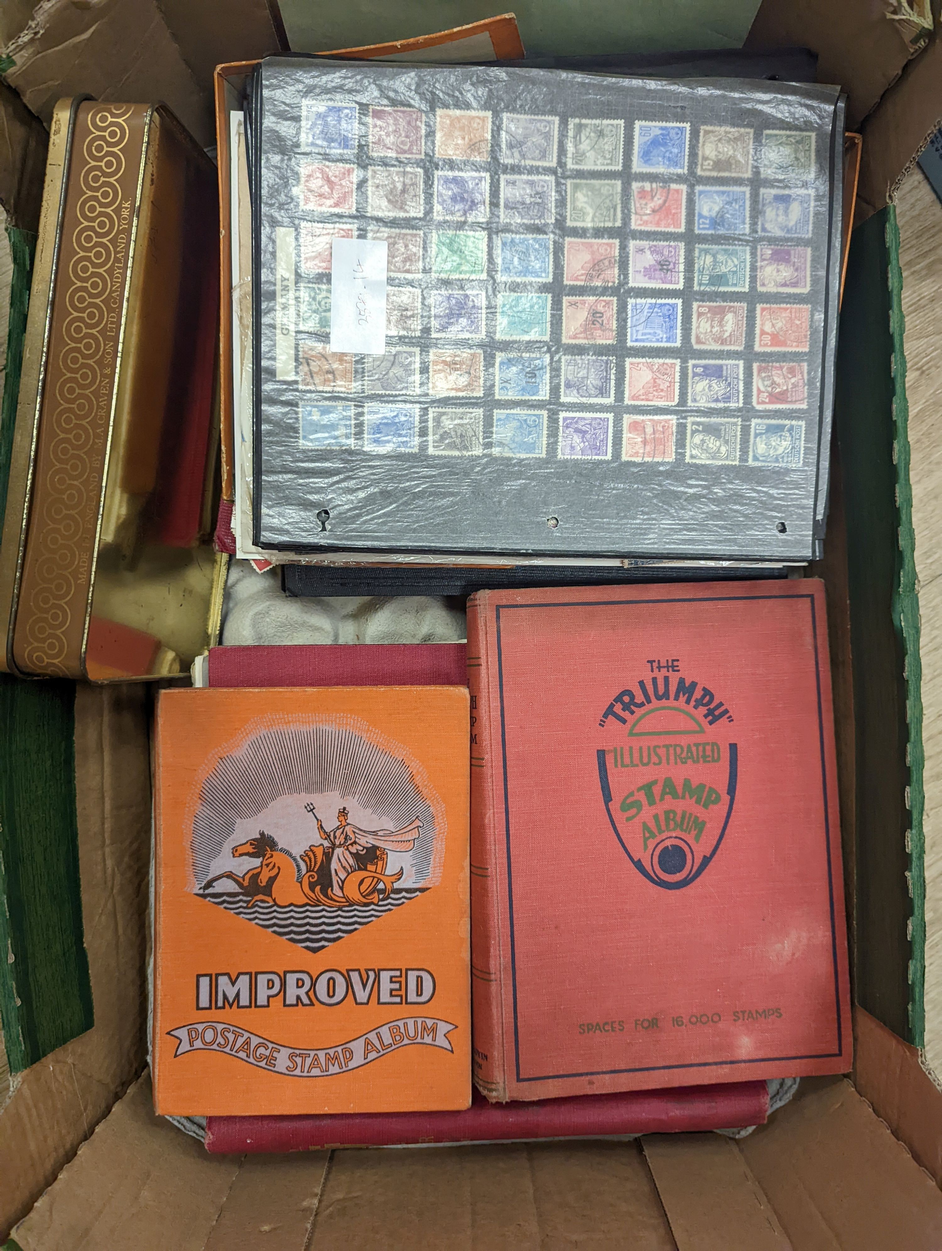 A quantity of loose stamps and albums